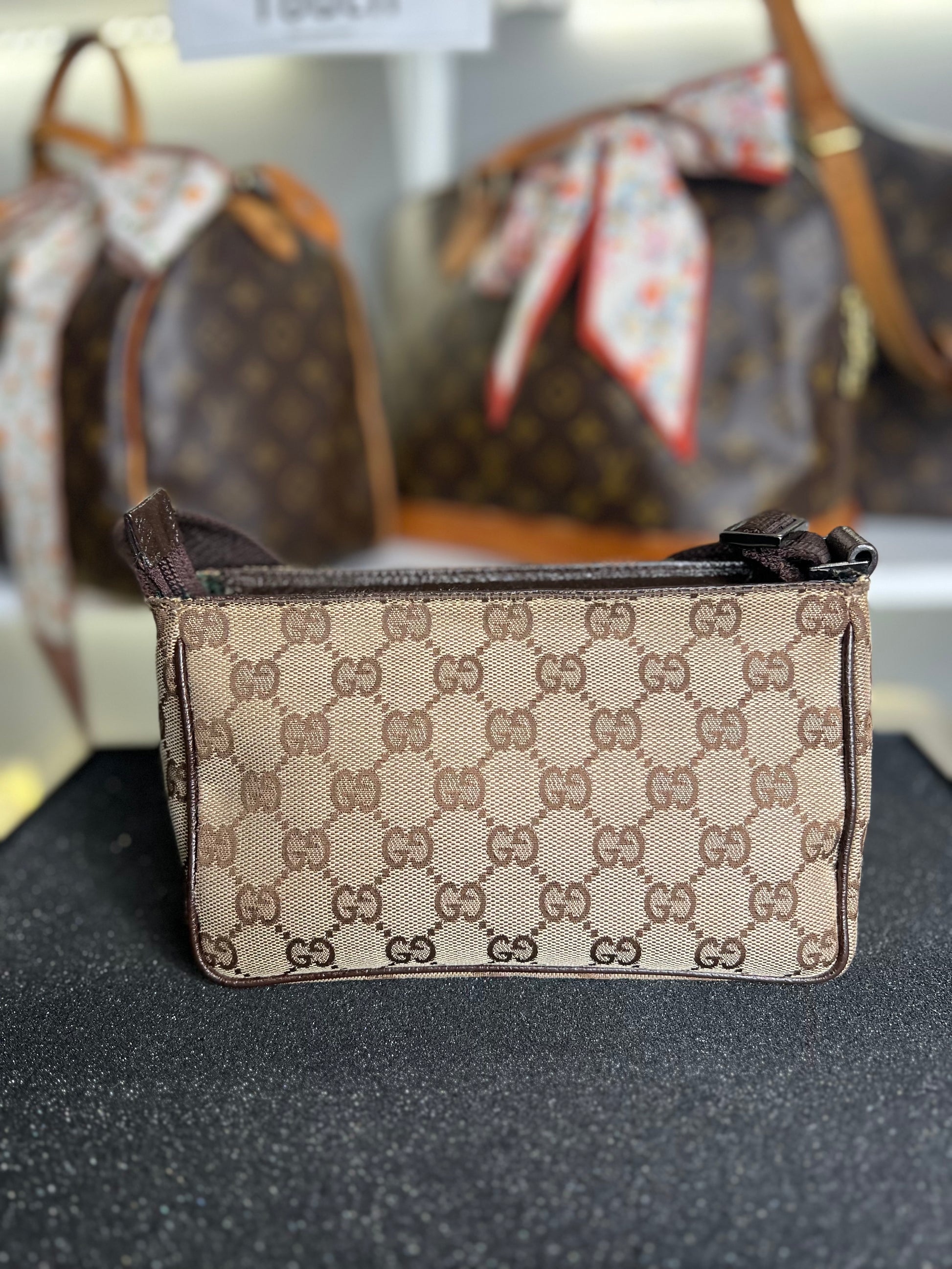 Gucci GG Canvas Mini Pochette