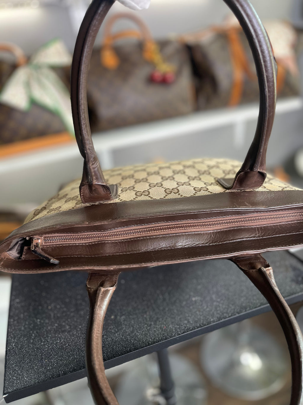 Gucci
GG Canvas Top Handle Bag