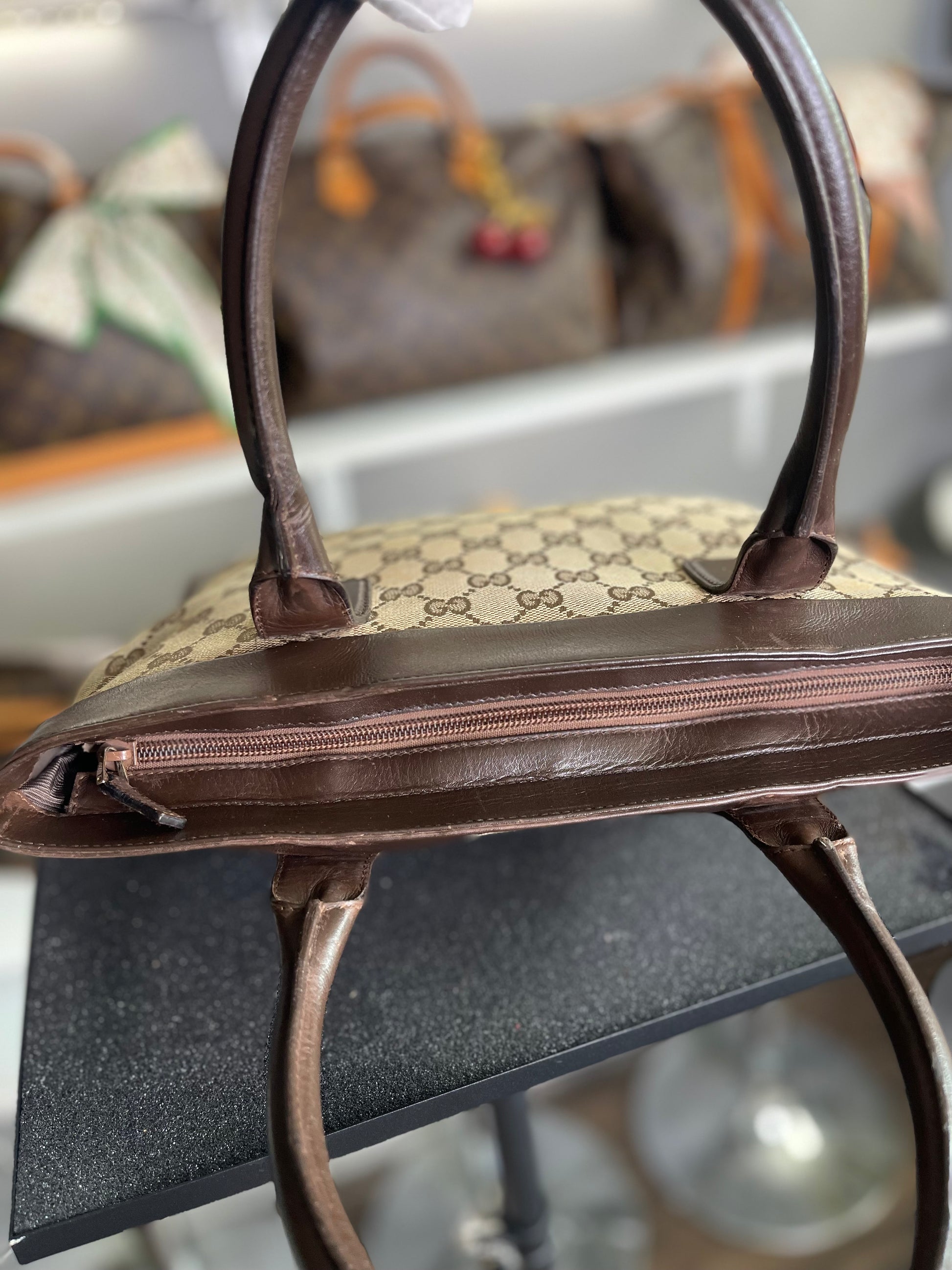 Gucci
GG Canvas Top Handle Bag