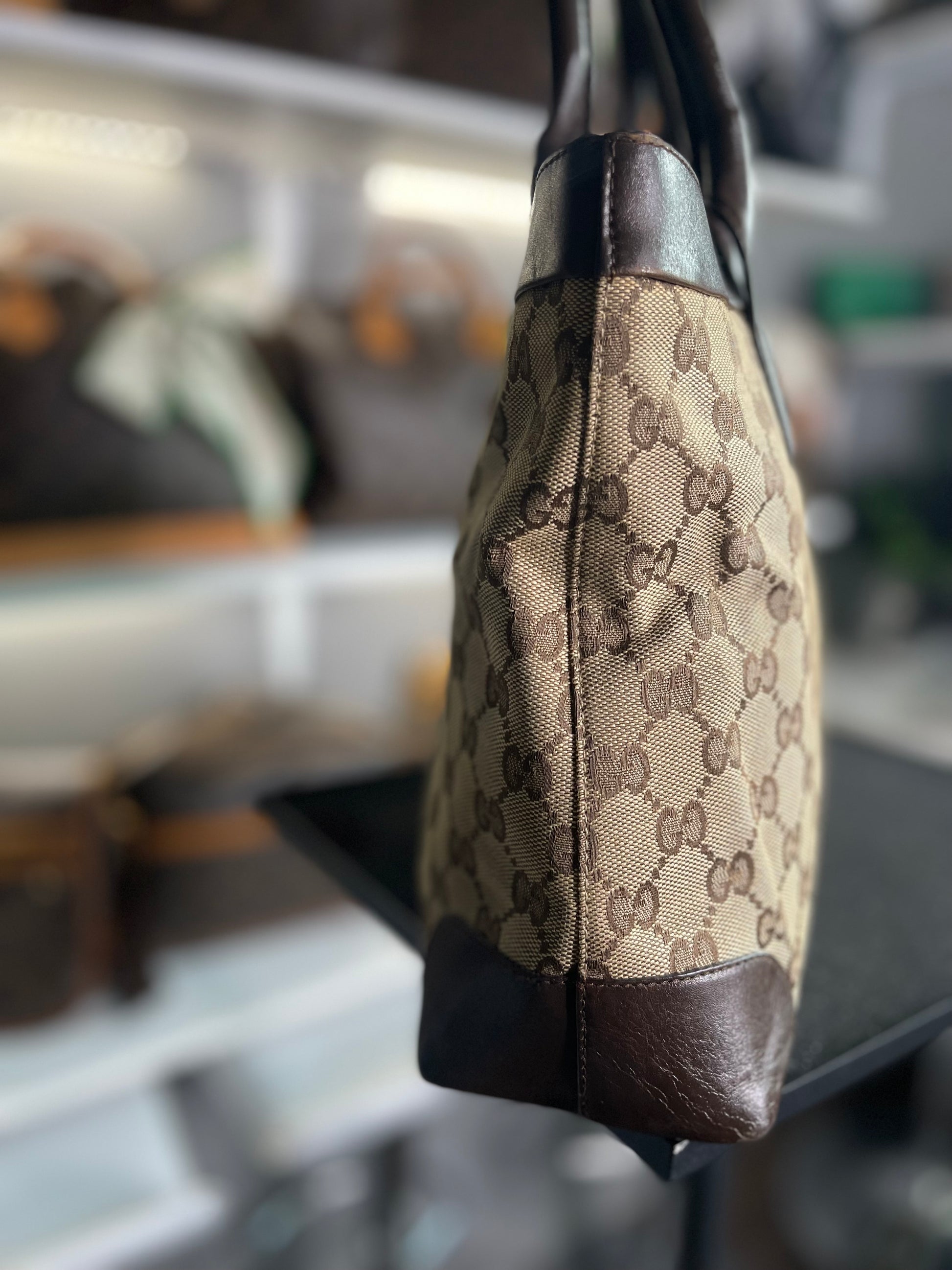 Gucci
GG Canvas Top Handle Bag
