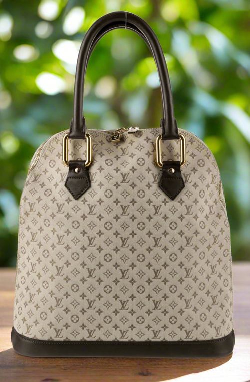 Authentic Louis Vuitton Monogram Mini Lin Alma Haut Bag Vintage
