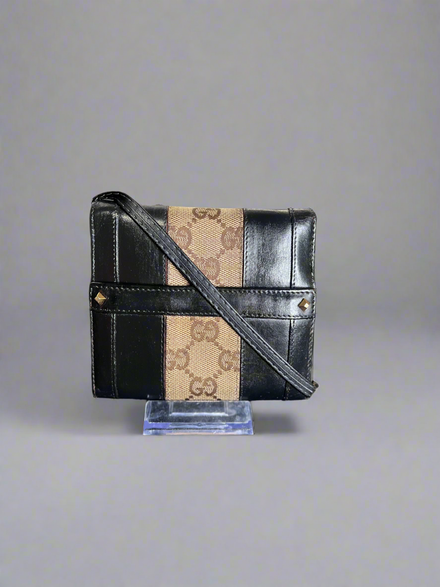 Gucci
GG Canvas Calfskin Compact Wallet