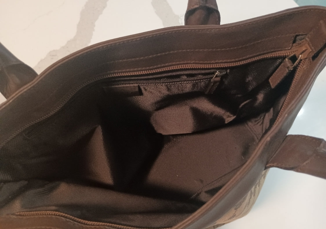 Gucci
GG Canvas Top Handle Bag
