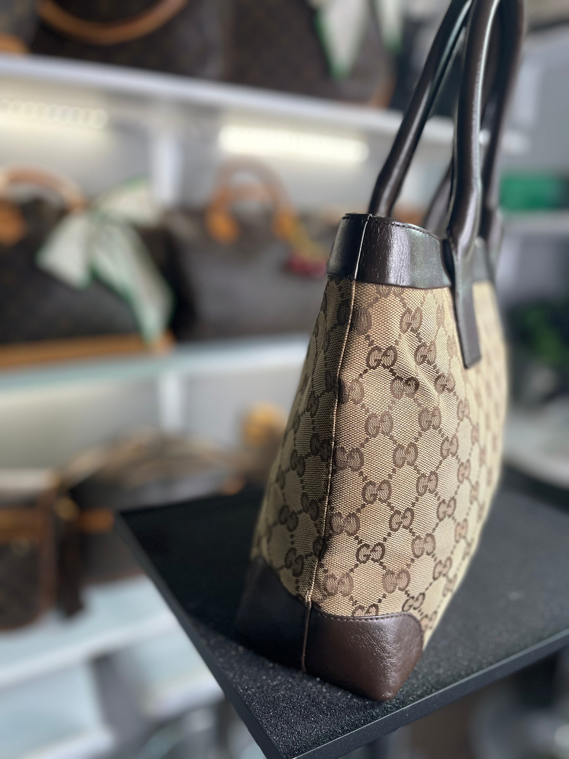 Gucci
GG Canvas Top Handle Bag