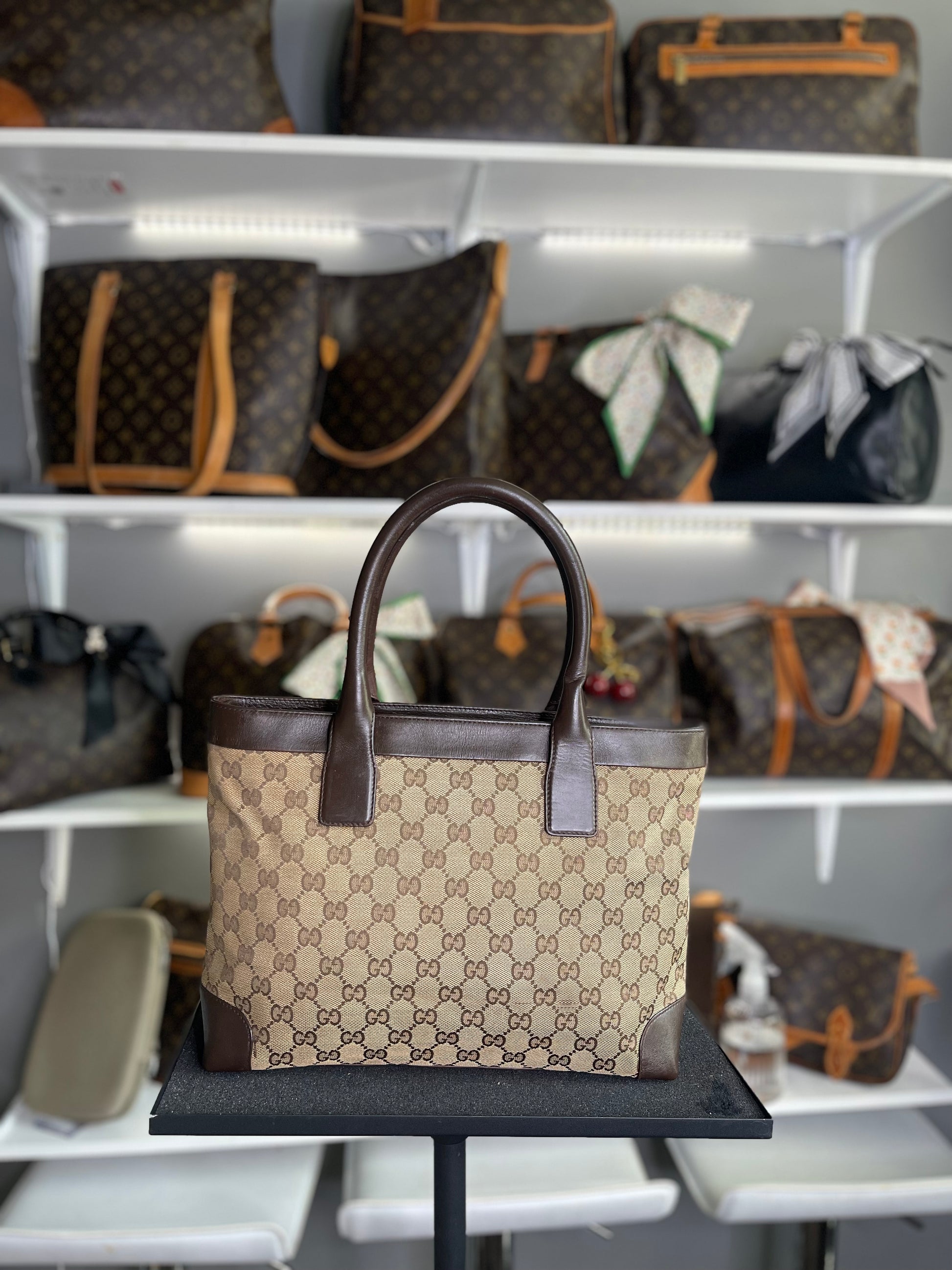 Gucci
GG Canvas Top Handle Bag