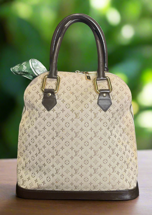 Authentic Louis Vuitton Monogram Mini Lin Alma Haut Bag Vintage