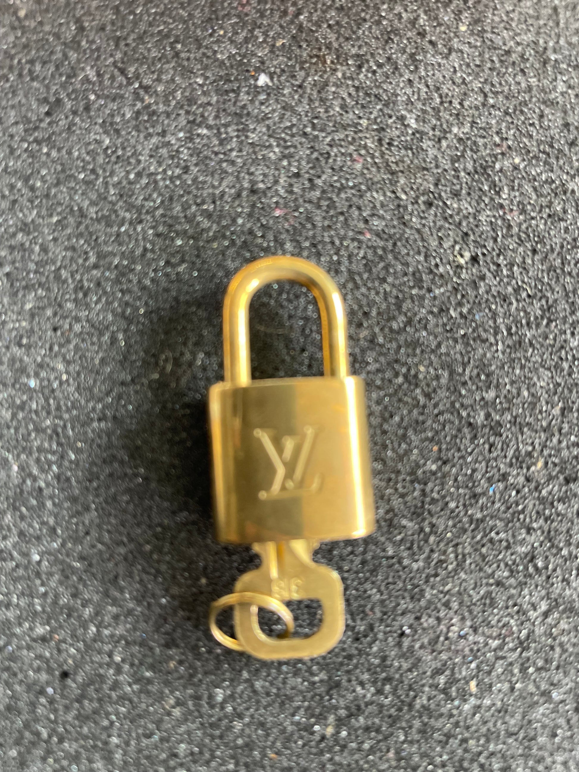 Louis Vuitton
Brass Lock & Key Set