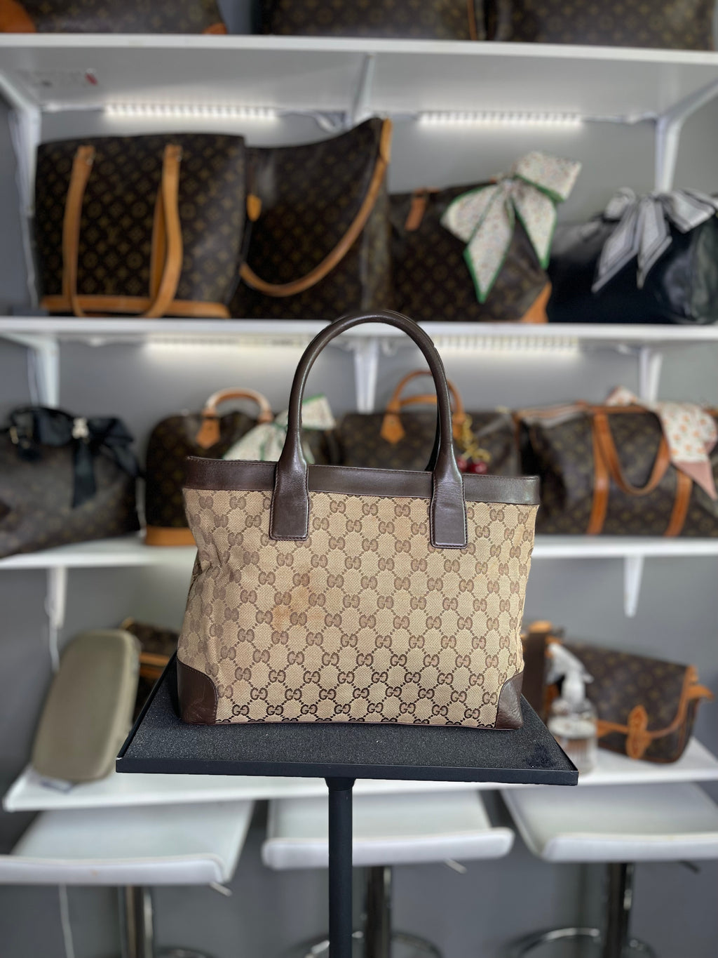 Gucci
GG Canvas Top Handle Bag