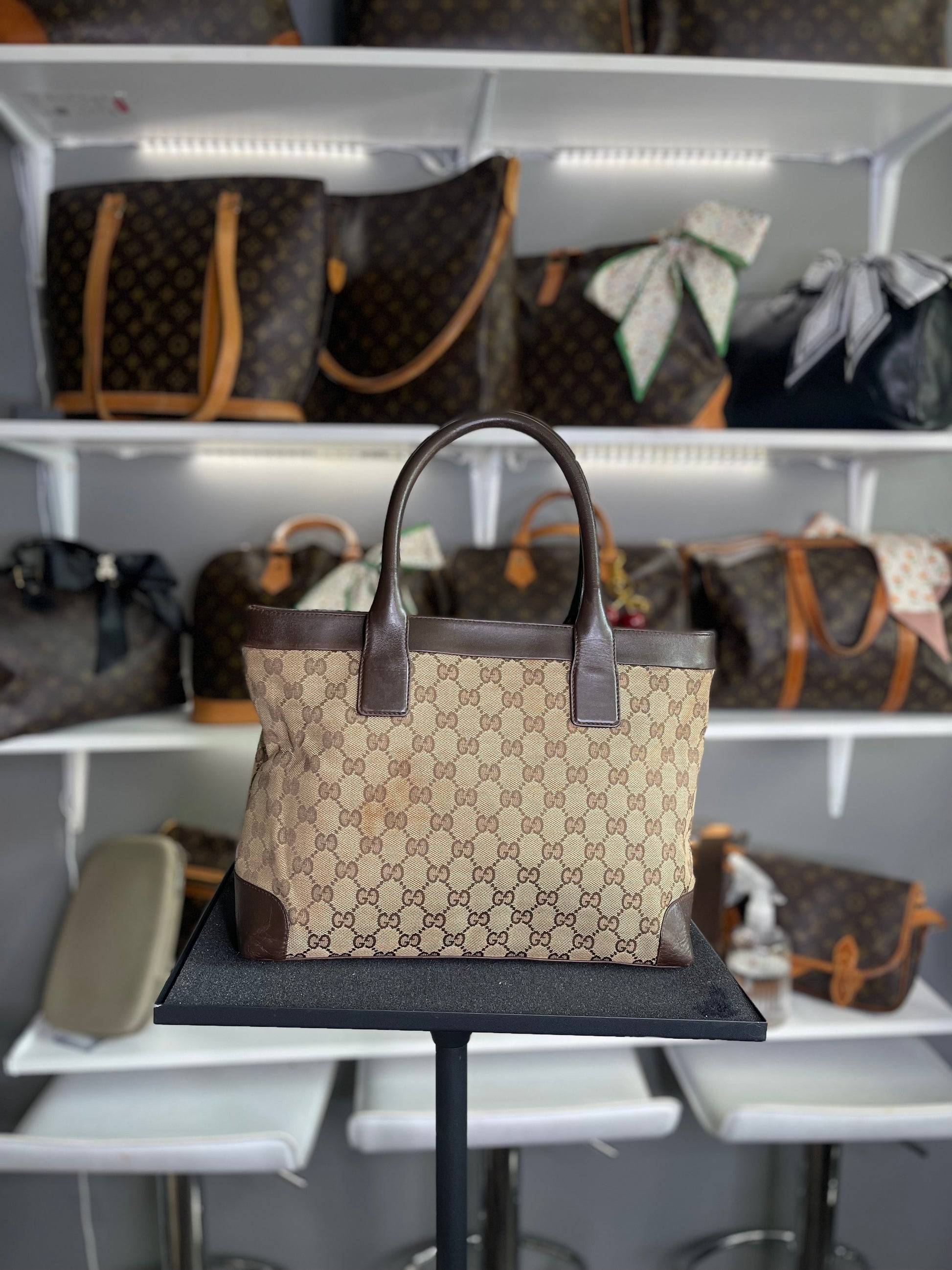 Gucci
GG Canvas Top Handle Bag