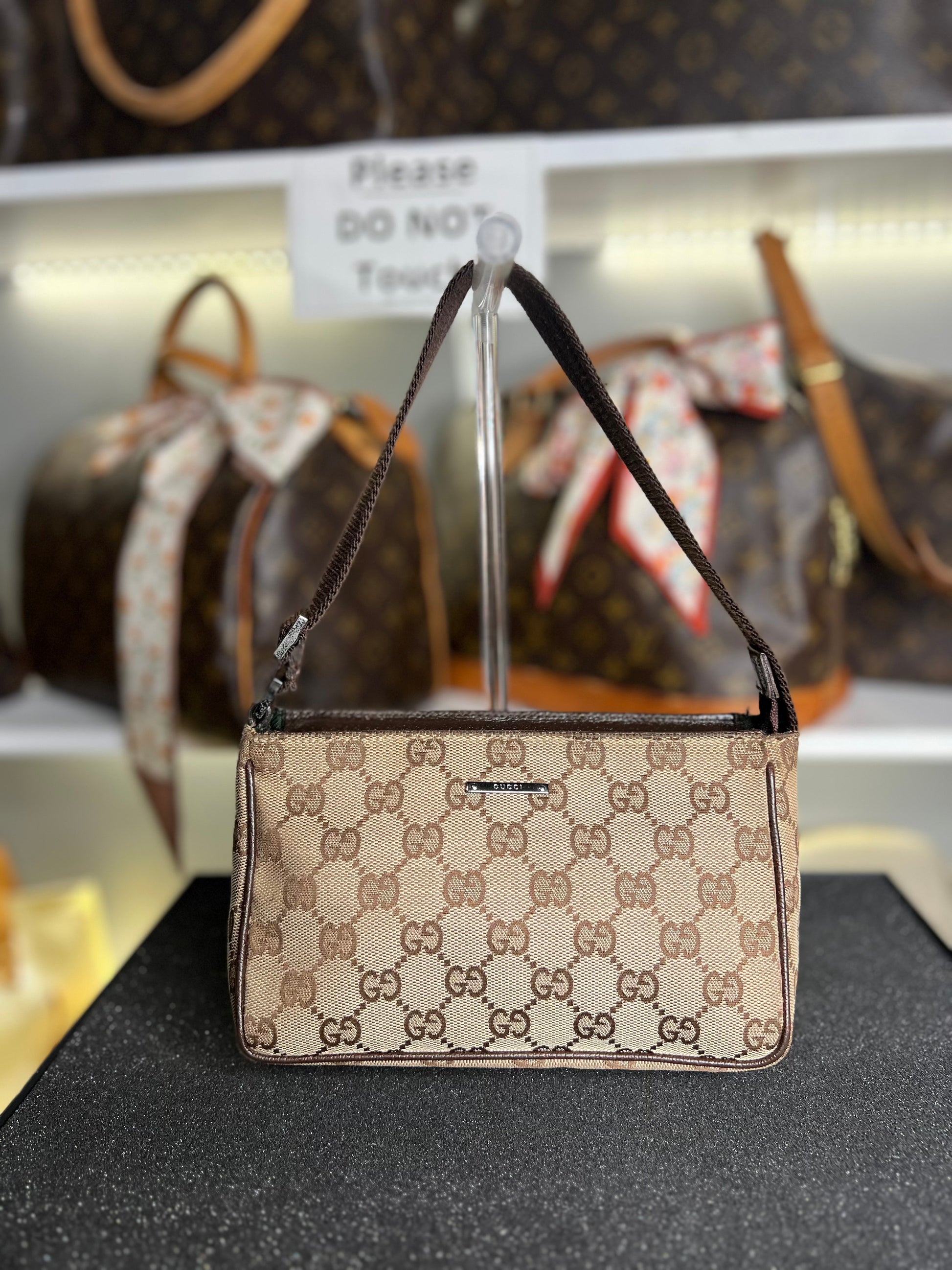 Gucci GG Canvas Mini Pochette