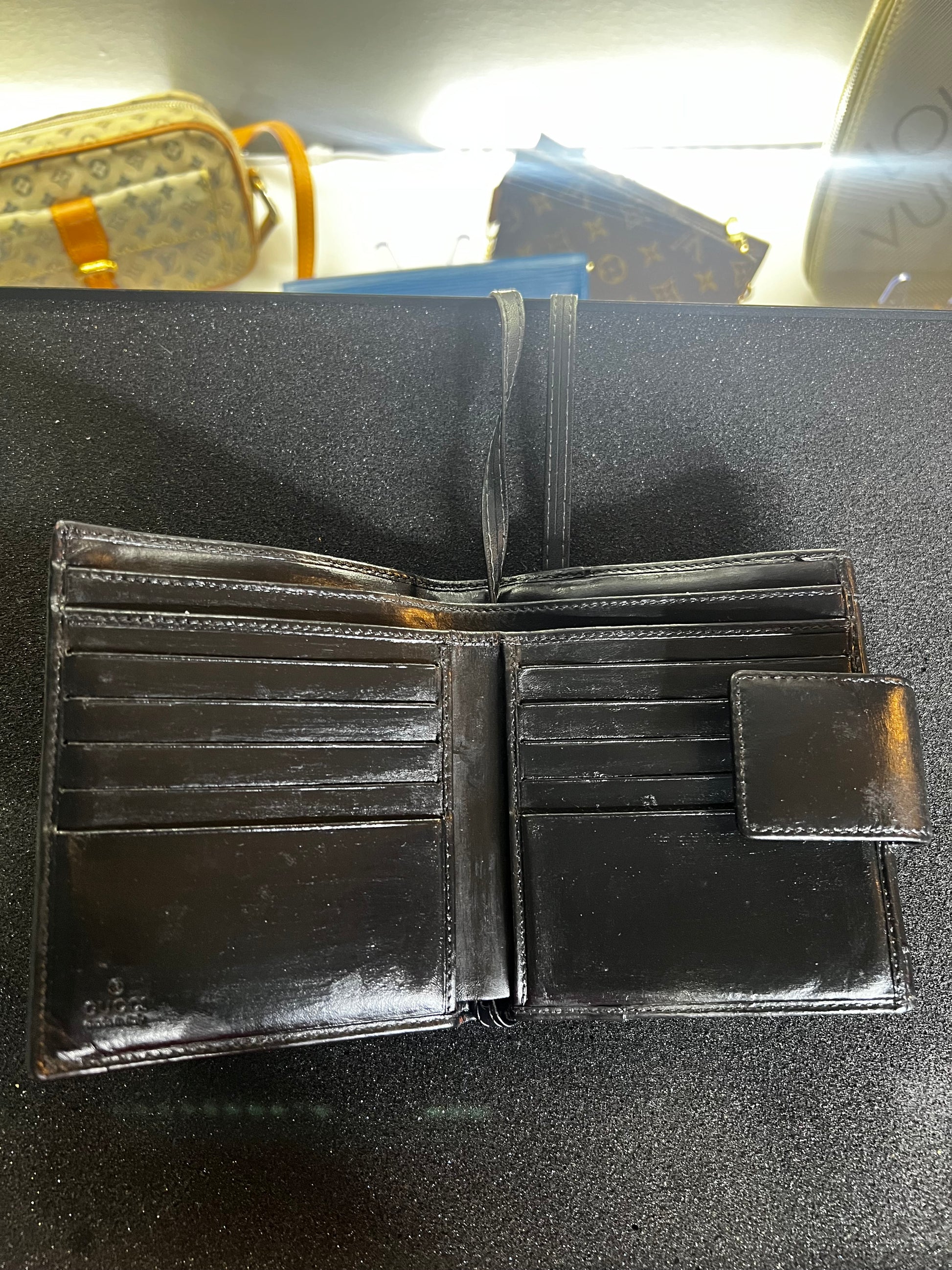 Gucci
GG Canvas Calfskin Compact Wallet